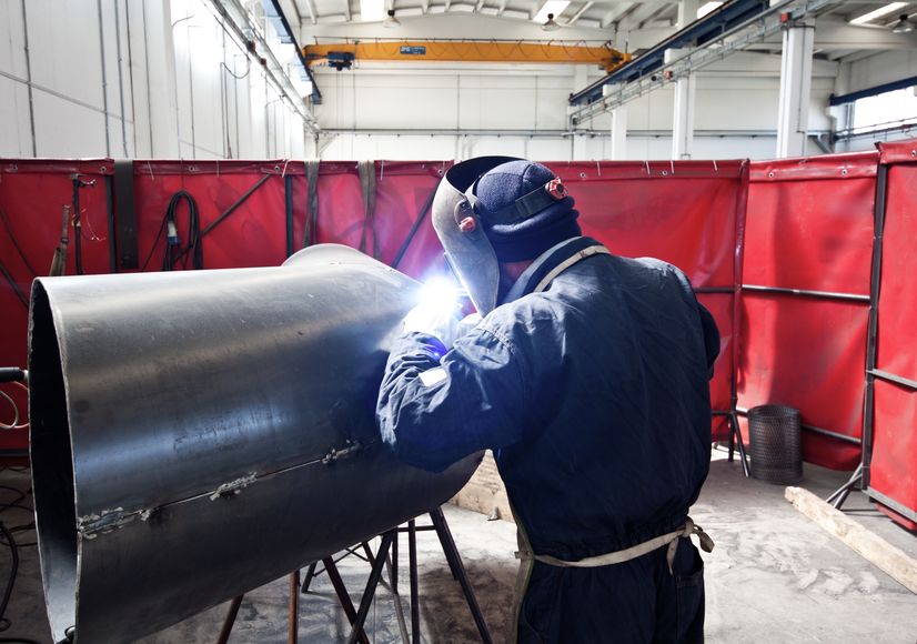 portrait of a welder at work